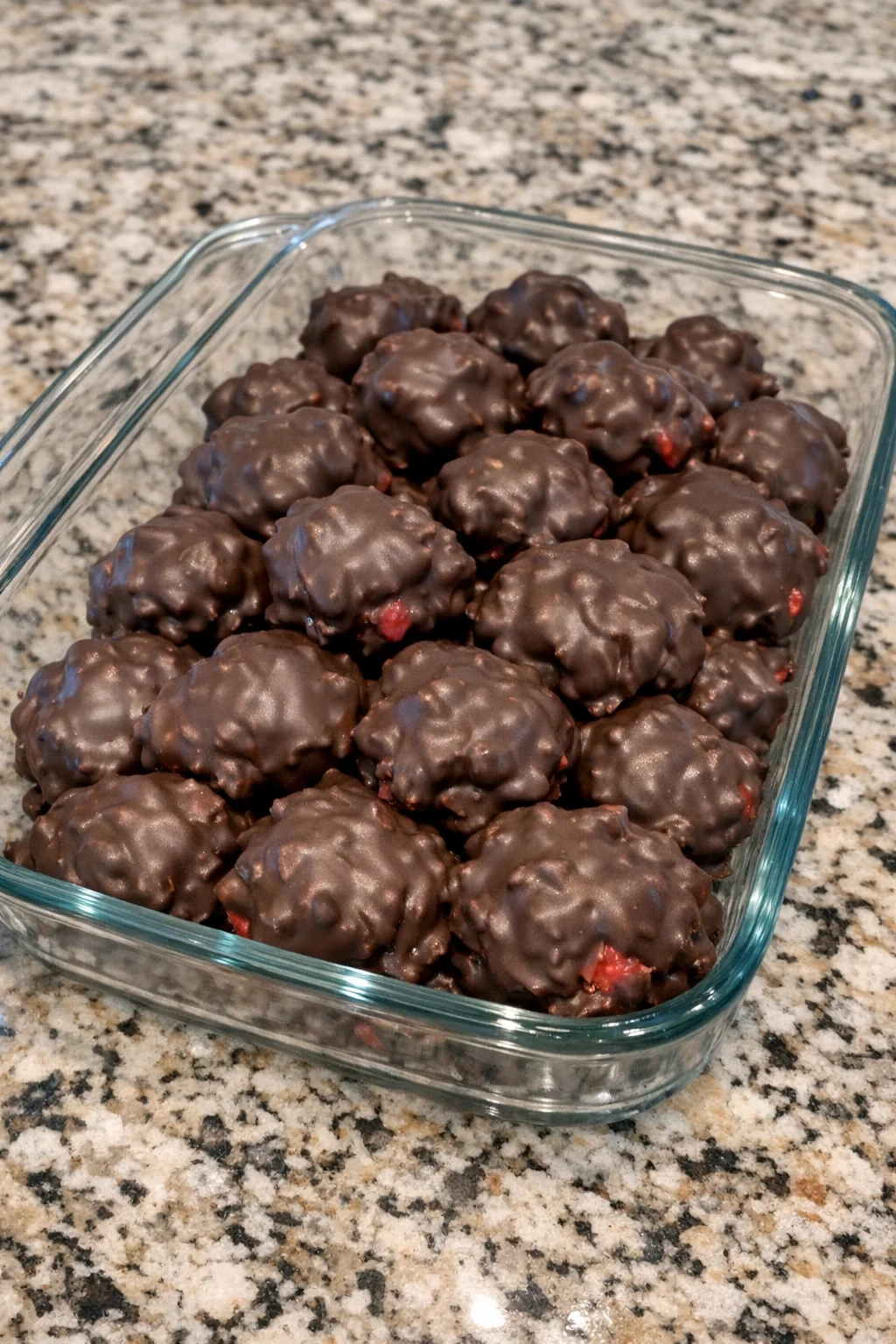 Chocolate-covered strawberry yogurt clusters on a serving plate