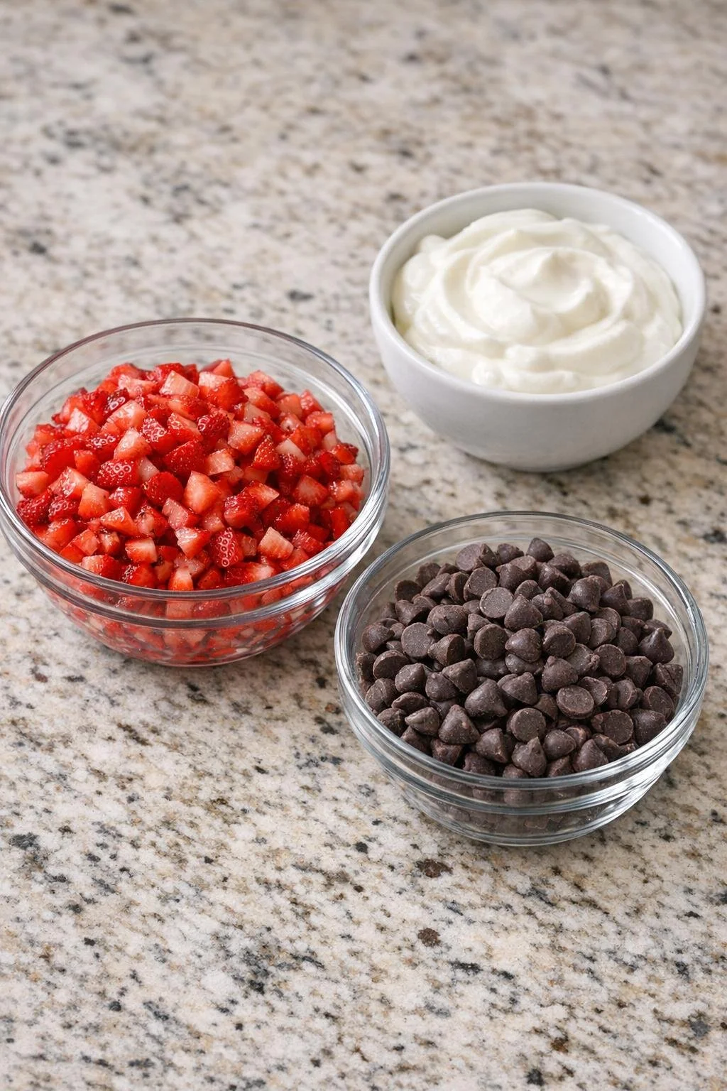 Strawberries, yogurt, and dark chocolate for the three-ingredient clusters