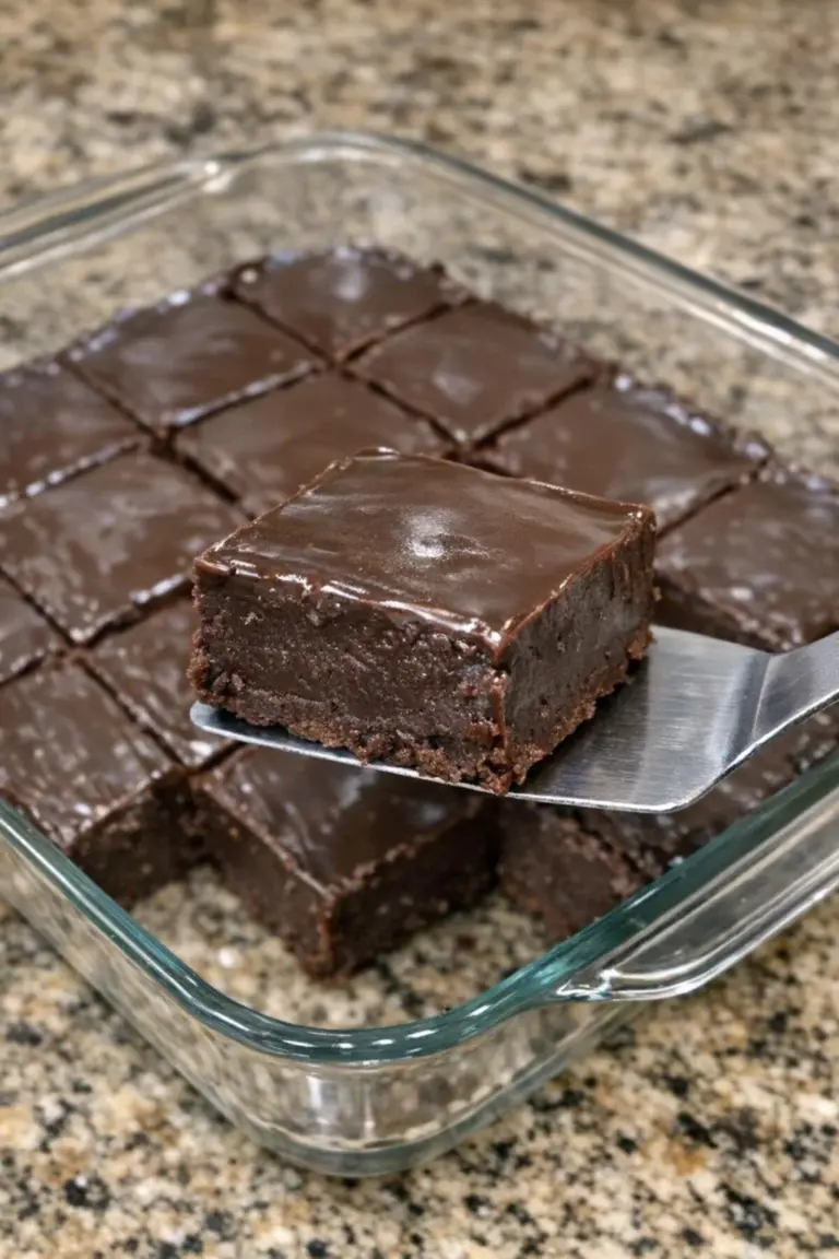 2-ingredient chocolate fudge ready to enjoy on a plate