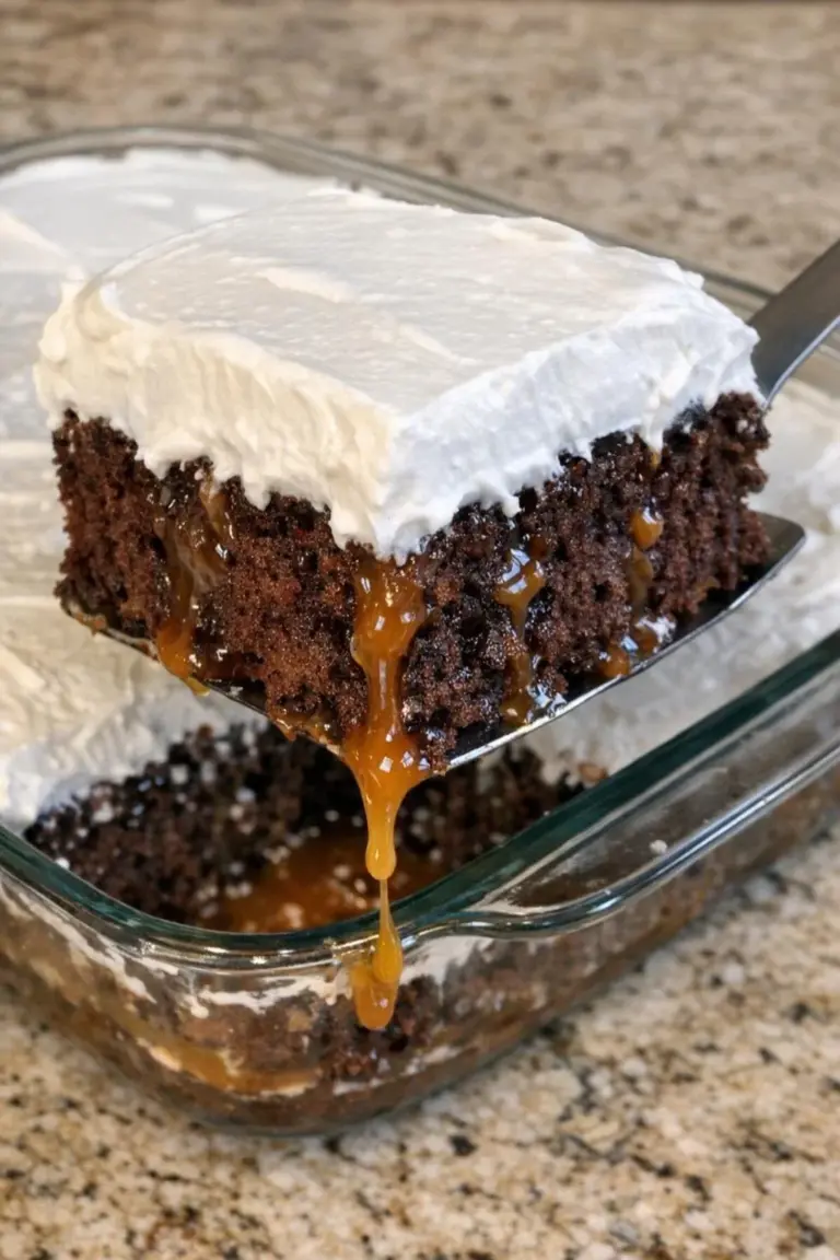 Delicious 4-ingredient Better Than Anything Cake topped with chocolate and caramel
