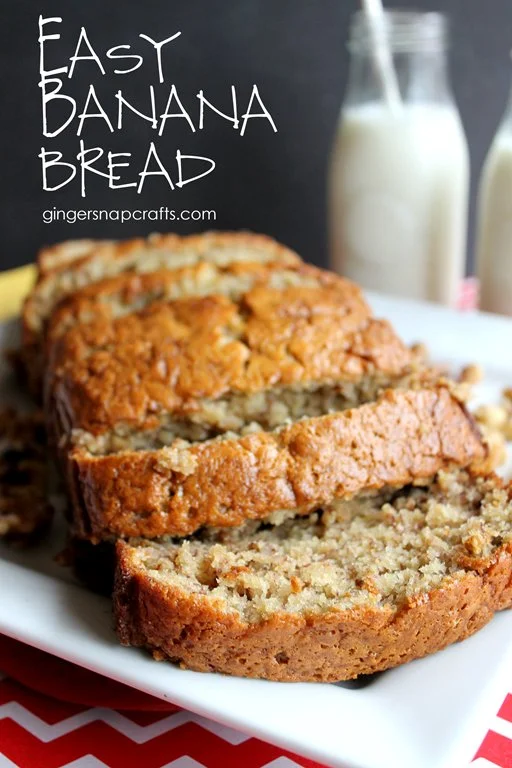 Loaf of freshly baked Banana Walnut Bread with walnuts and bananas