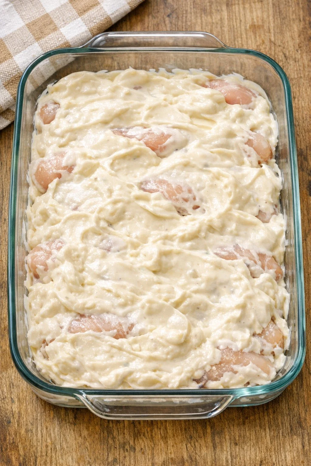 Chicken covered with a smooth soup and sour cream sauce