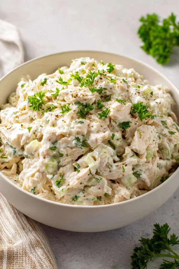 Fresh and colorful chicken salad with vegetables in a bowl