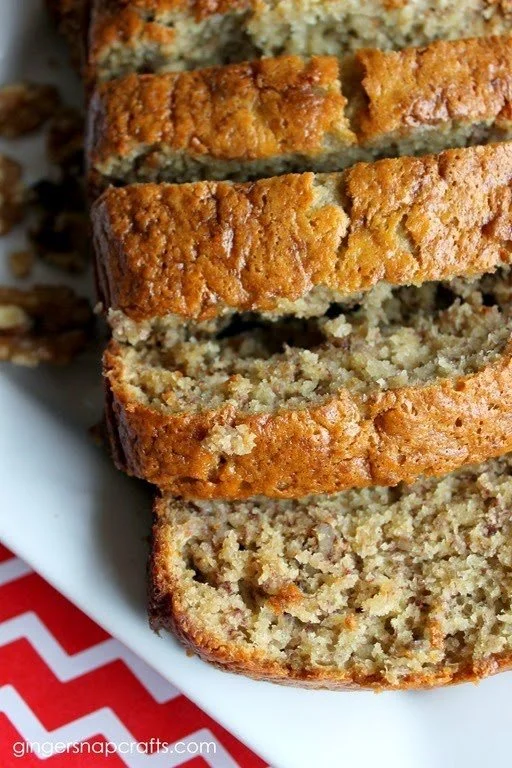 Deliciously baked easy banana bread loaf on a wooden table