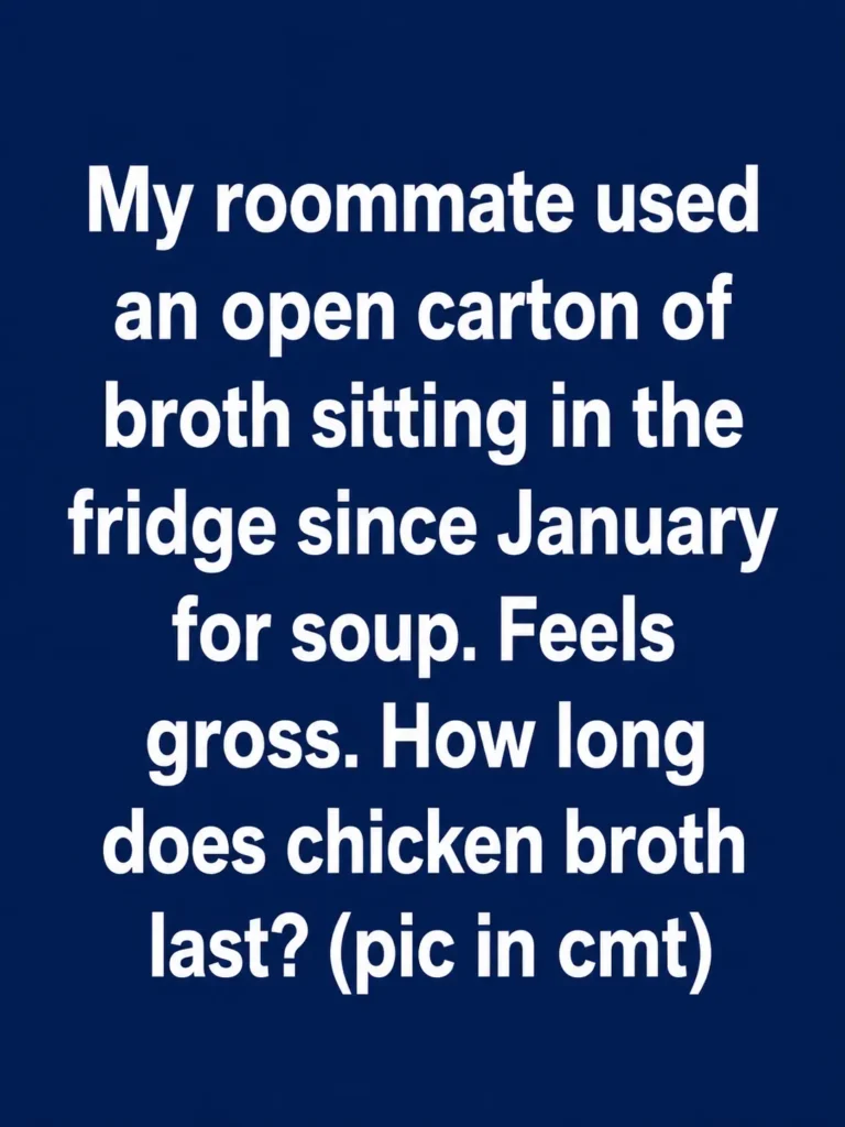 Open carton of chicken broth sitting on a refrigerator shelf