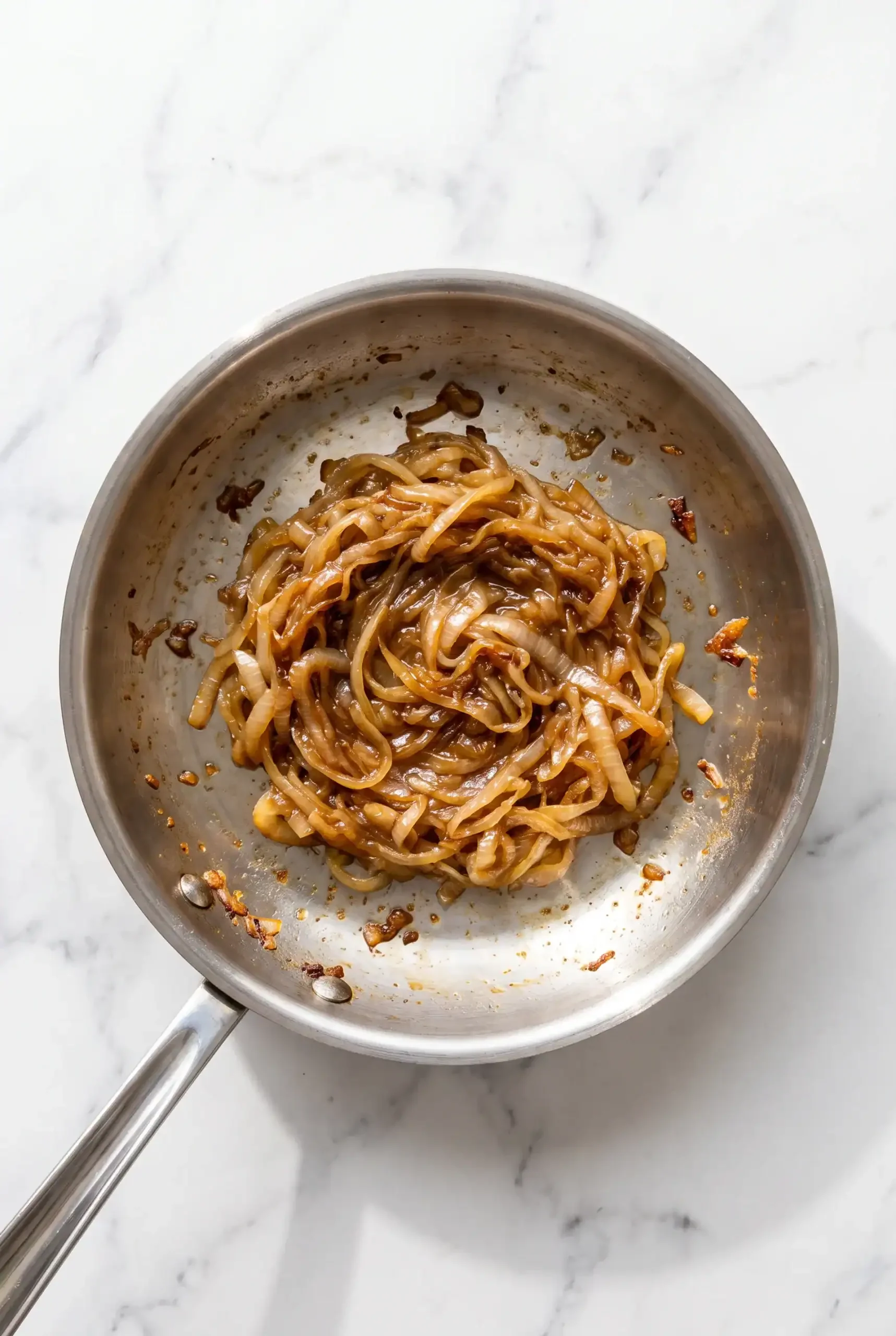 Golden caramelized onions in a skillet