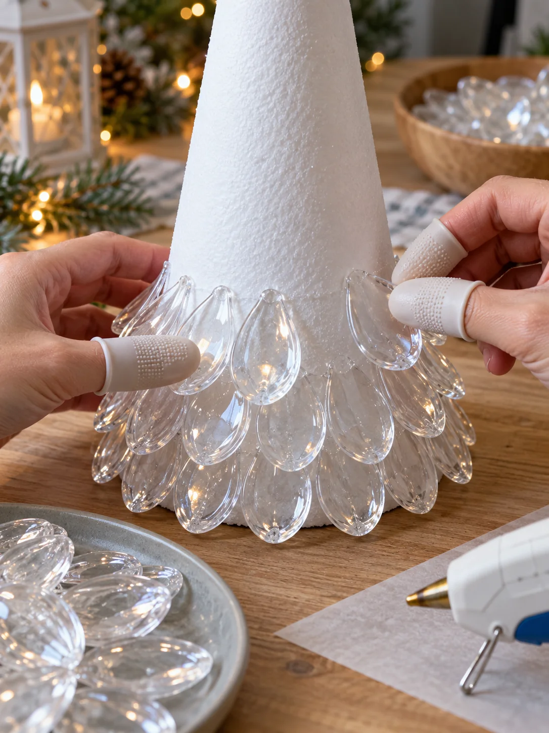 First overlapping ring of clear spoon petals attached to a foam cone