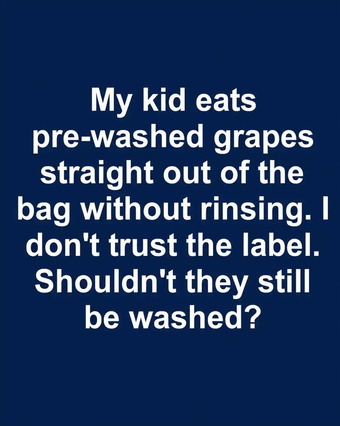 Pre-washed grapes being rinsed under cool running water before eating