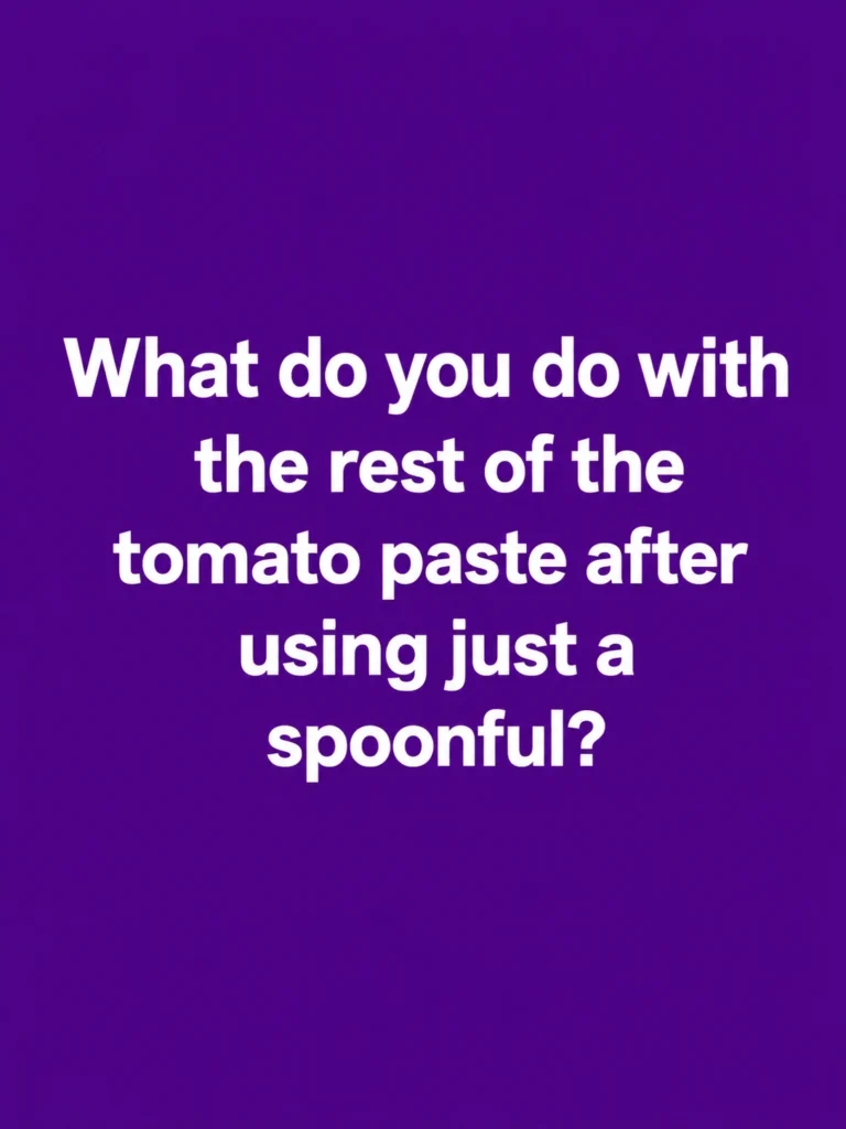 Open can of tomato paste with a spoon beside homemade pasta sauce and soup